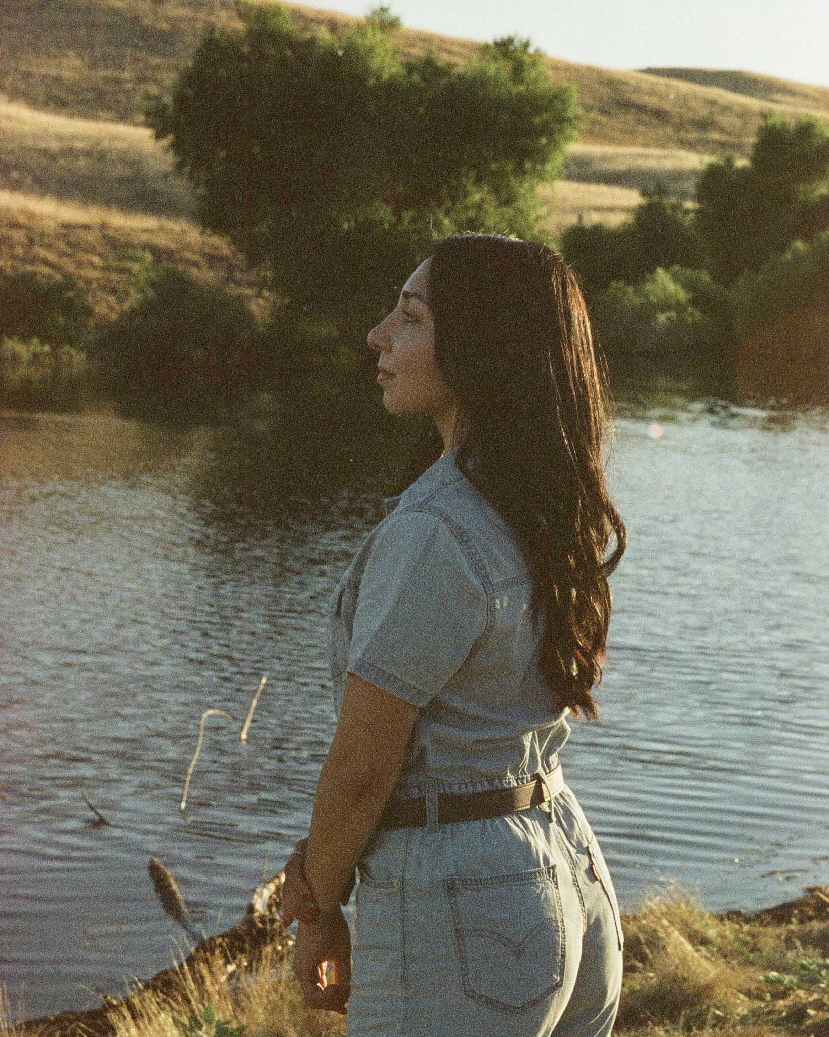 Christina’s film photo of a woman beside a river